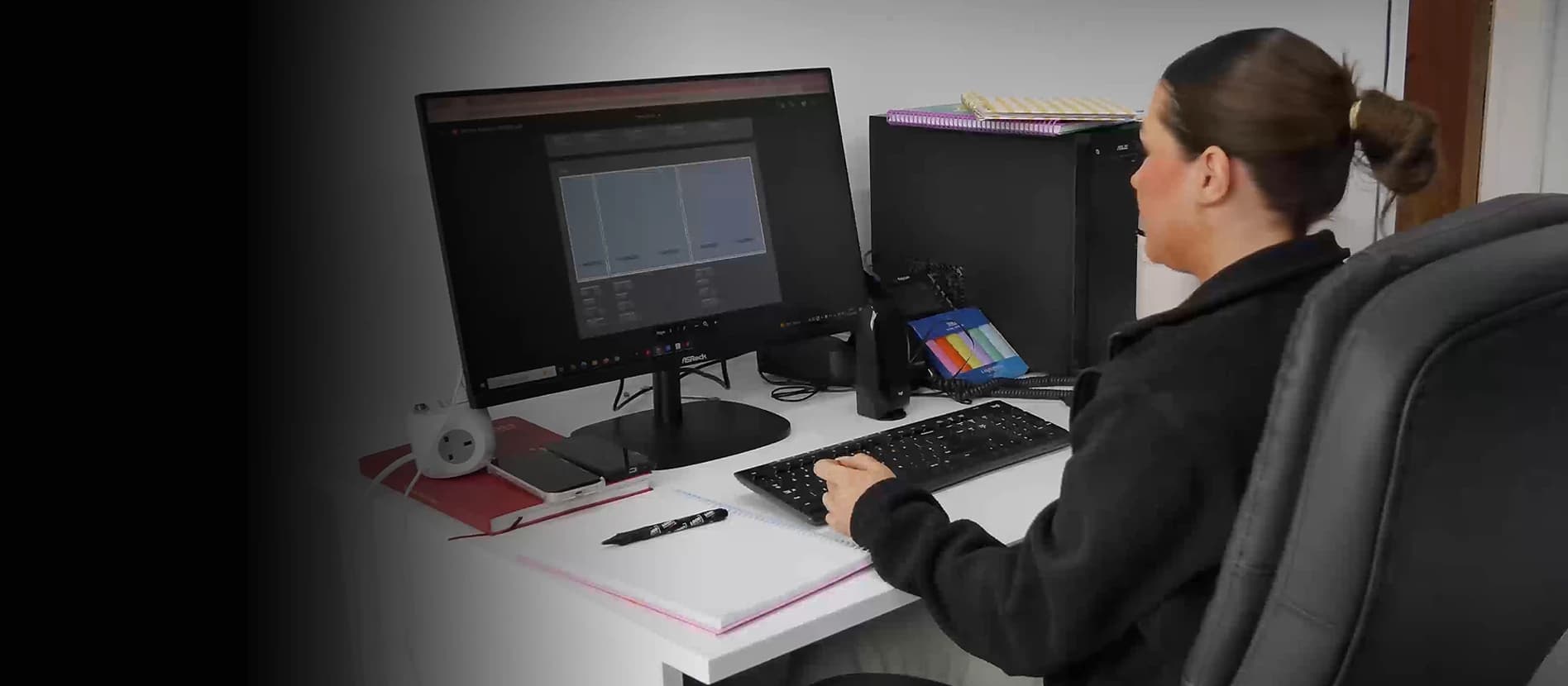 Logo Printed Blinds team member preparing custom blind design proofs